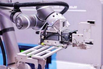 Robotic arm performing precision automation in electronics manufacturing at NEPCON Asia